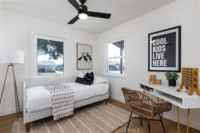 bedroom featuring ceiling fan and wood-type flooring