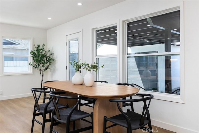 dining room with light hardwood / wood-style flooring