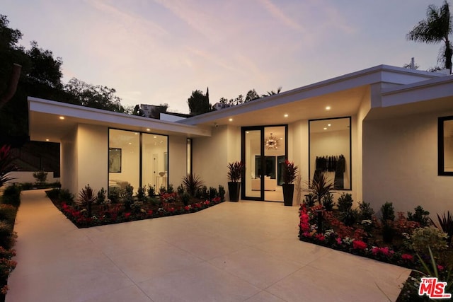 modern home featuring a patio area