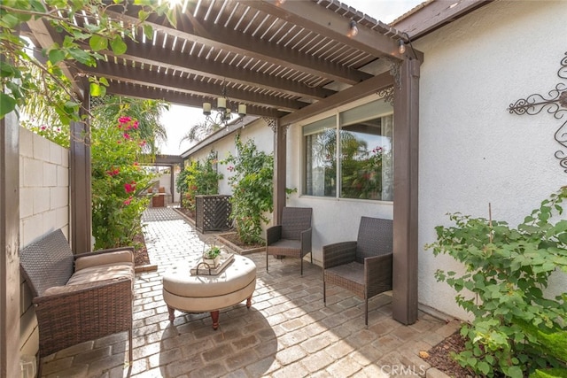 view of patio / terrace featuring a pergola