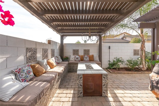 view of patio with outdoor lounge area and a pergola