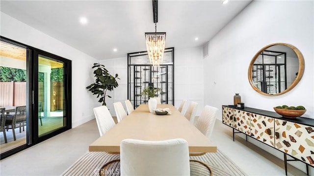 dining room featuring a chandelier