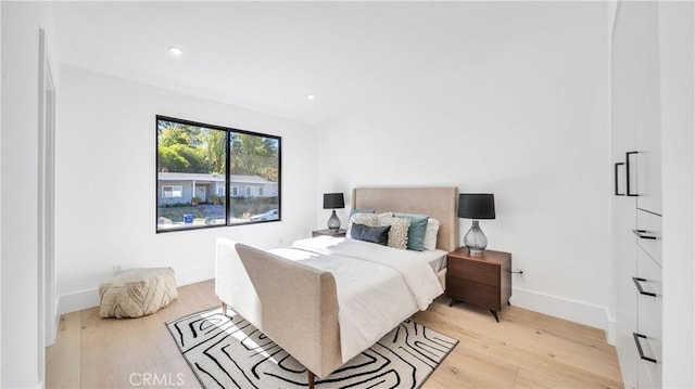 bedroom featuring light hardwood / wood-style flooring