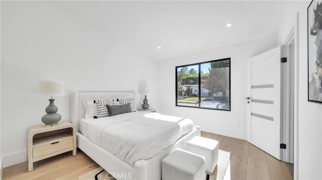 bedroom featuring light wood-type flooring