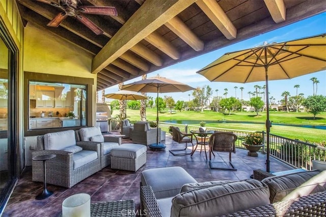 view of patio with ceiling fan and an outdoor hangout area