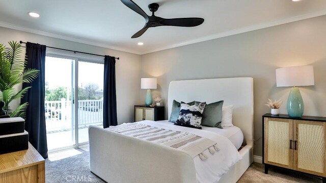 carpeted bedroom with access to outside, ceiling fan, and ornamental molding