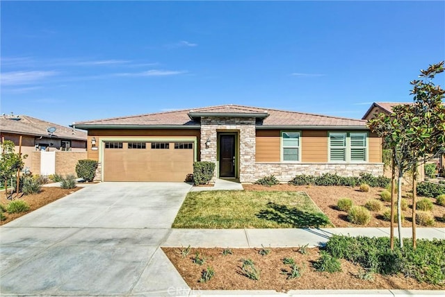 prairie-style house featuring a garage