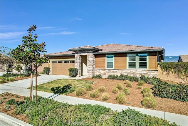 prairie-style house featuring a garage