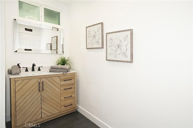 bathroom with vanity and tile patterned floors