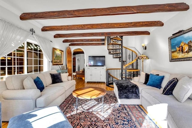 living room with hardwood / wood-style flooring and beamed ceiling