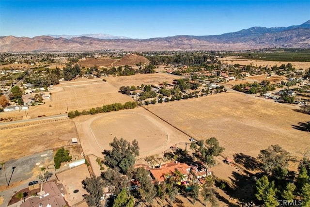 drone / aerial view featuring a mountain view