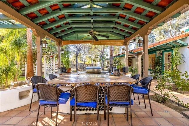 view of patio featuring ceiling fan, a gazebo, and area for grilling