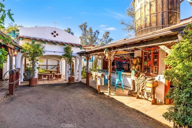 view of patio / terrace with a bar