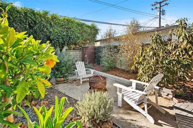 view of patio / terrace featuring a fire pit