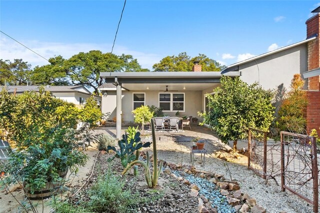 back of property with a patio area