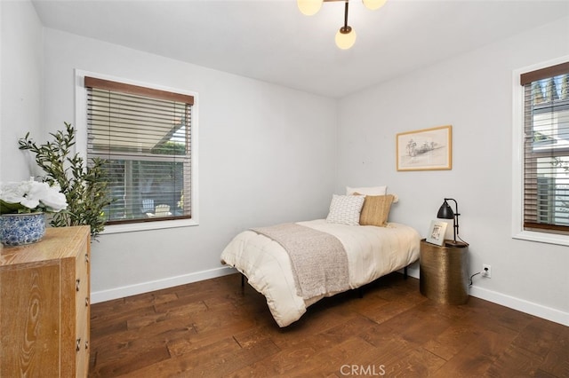 bedroom featuring dark wood-type flooring