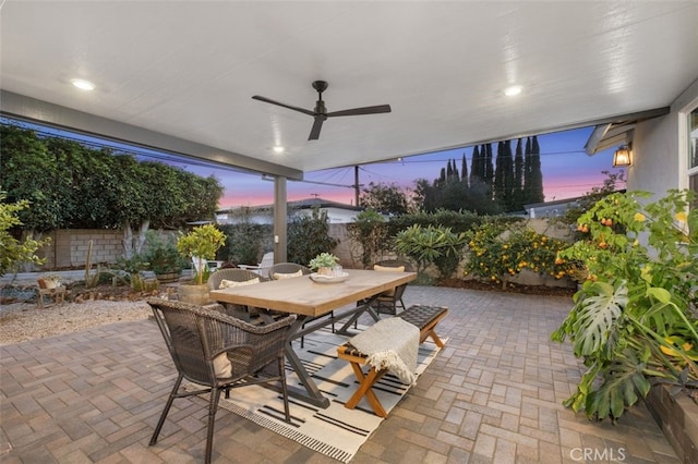 patio terrace at dusk with ceiling fan