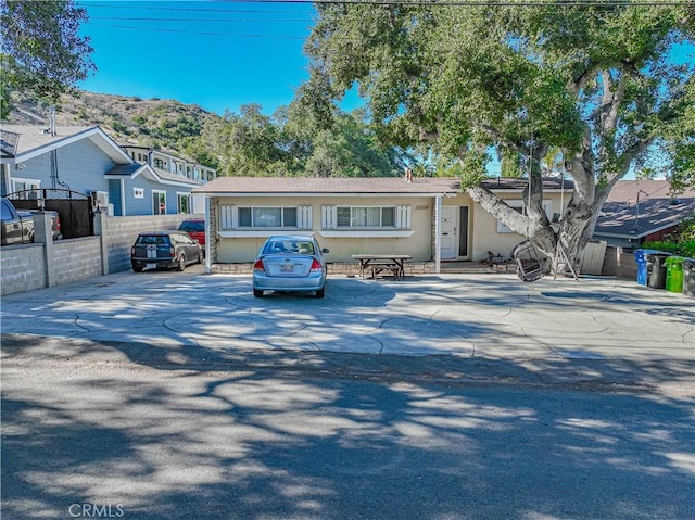 view of front of home featuring a mountain view