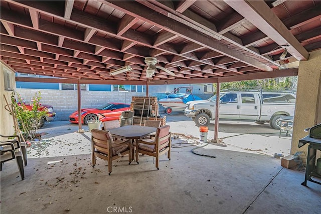 view of patio featuring ceiling fan