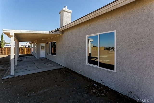 view of home's exterior with a patio