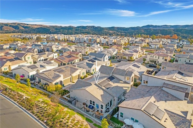 drone / aerial view featuring a mountain view