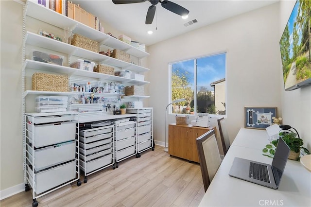 interior space featuring light hardwood / wood-style flooring and ceiling fan