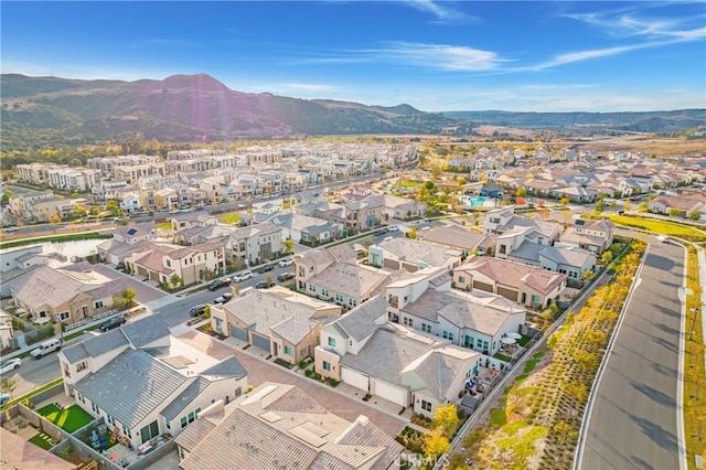 drone / aerial view featuring a mountain view