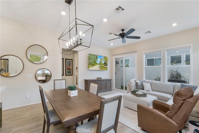 dining room featuring ceiling fan and light hardwood / wood-style floors