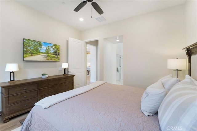 bedroom featuring ceiling fan and light wood-type flooring