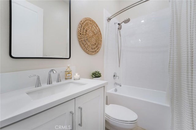 full bathroom with vanity, toilet, and shower / bath combo with shower curtain