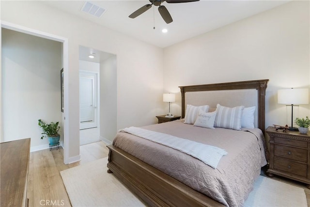 bedroom featuring light hardwood / wood-style flooring and ceiling fan