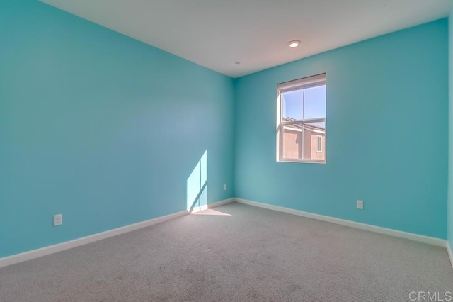 view of carpeted spare room