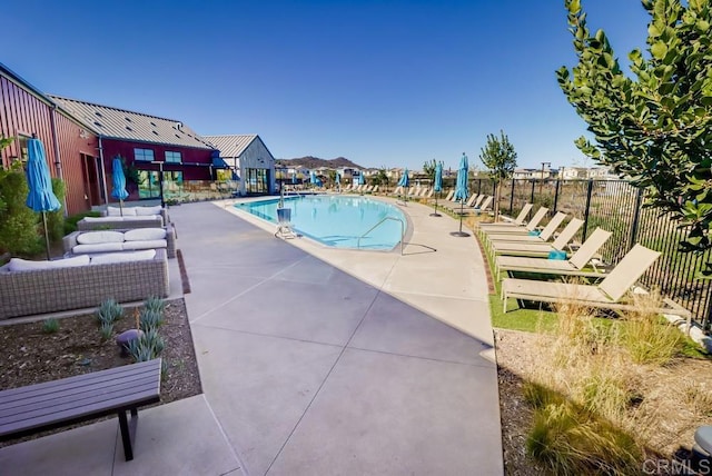 view of pool with a patio area and outdoor lounge area