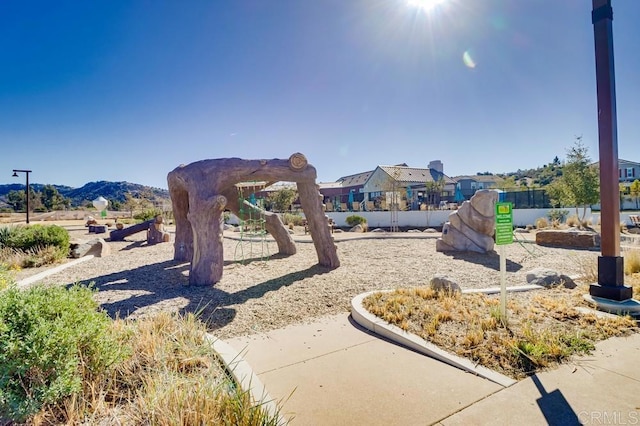 view of play area featuring a mountain view