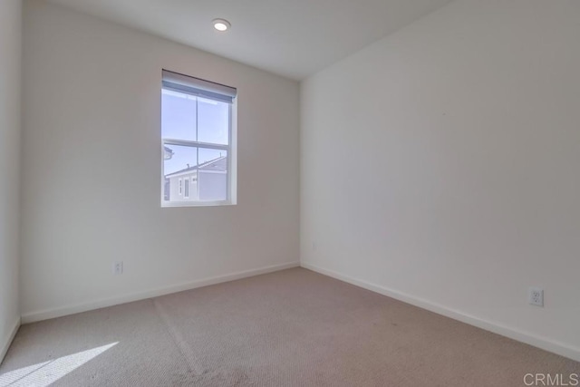 view of carpeted spare room