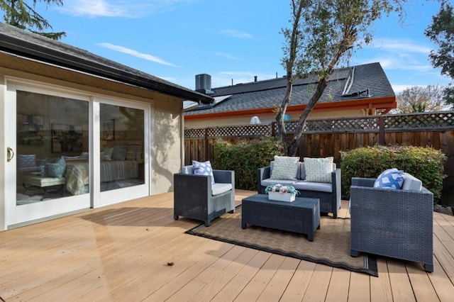 wooden deck featuring an outdoor living space