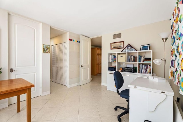 office space featuring light tile patterned flooring