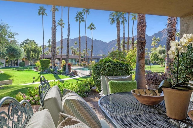 view of patio / terrace with a mountain view