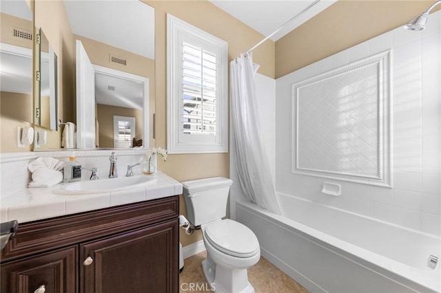 full bathroom with toilet, shower / tub combo, tile patterned floors, and vanity