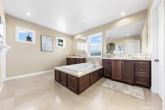 bathroom featuring tile patterned floors and vanity