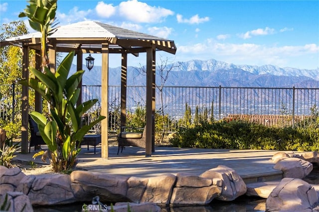 view of patio / terrace featuring a gazebo and a mountain view