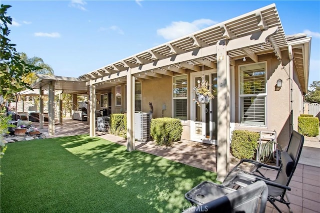 back of property featuring a yard, central AC unit, a pergola, and a patio