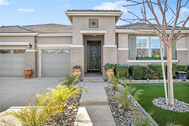 view of front of home featuring a garage and a front lawn