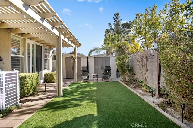 view of yard featuring a pergola, a storage unit, a patio, and central AC unit