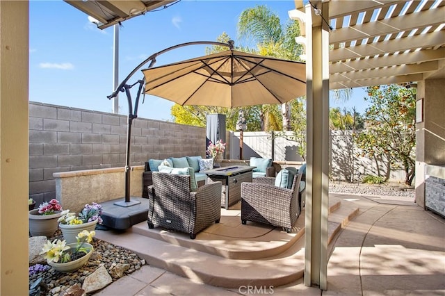 view of patio with a pergola and an outdoor living space