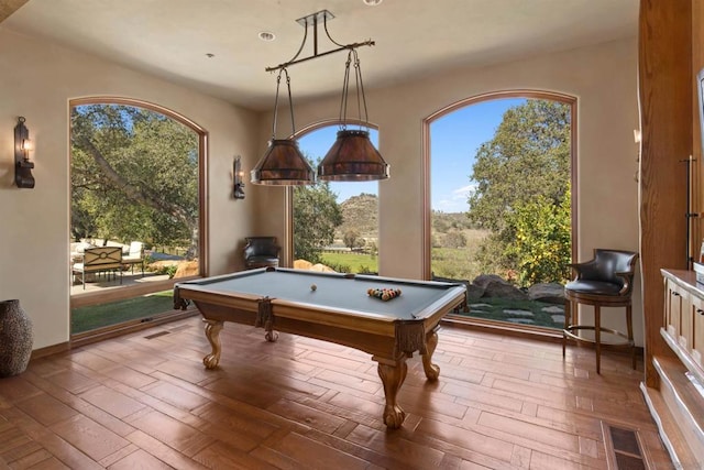 recreation room with pool table and wood-type flooring