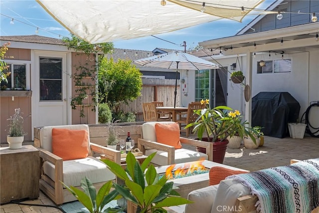 view of patio featuring a grill and outdoor lounge area