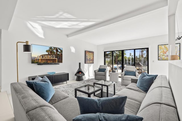 living room with beam ceiling