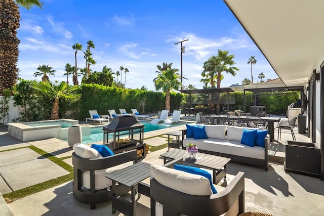 view of patio / terrace with a pool with hot tub and outdoor lounge area