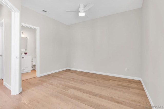 unfurnished room featuring ceiling fan and light hardwood / wood-style flooring